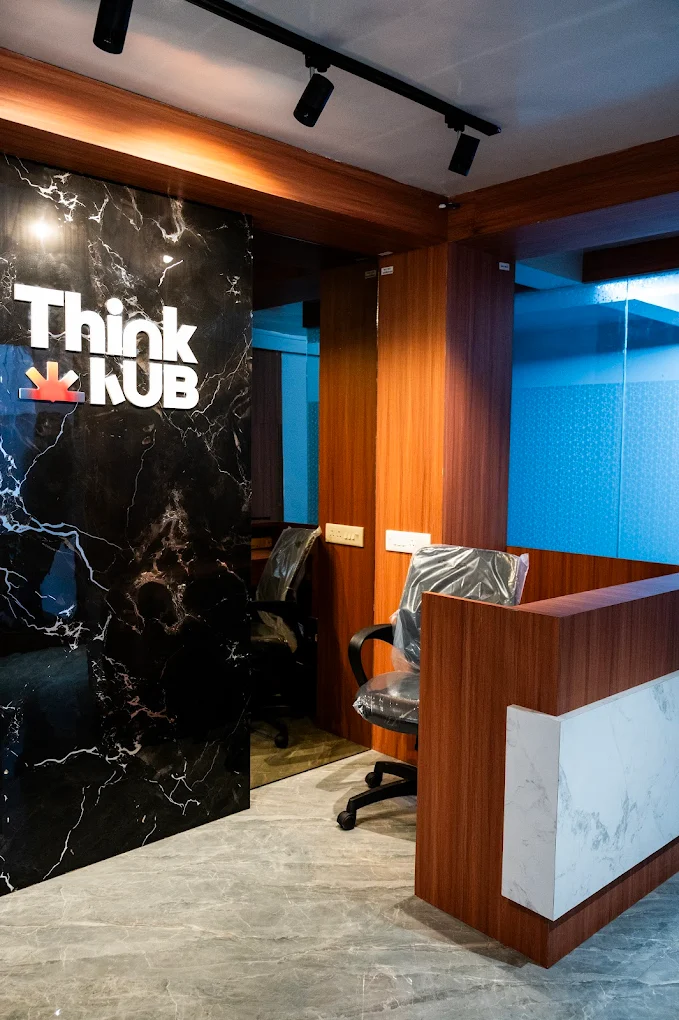 Think Hub team using the Kanrivo platform on a laptop during onboarding