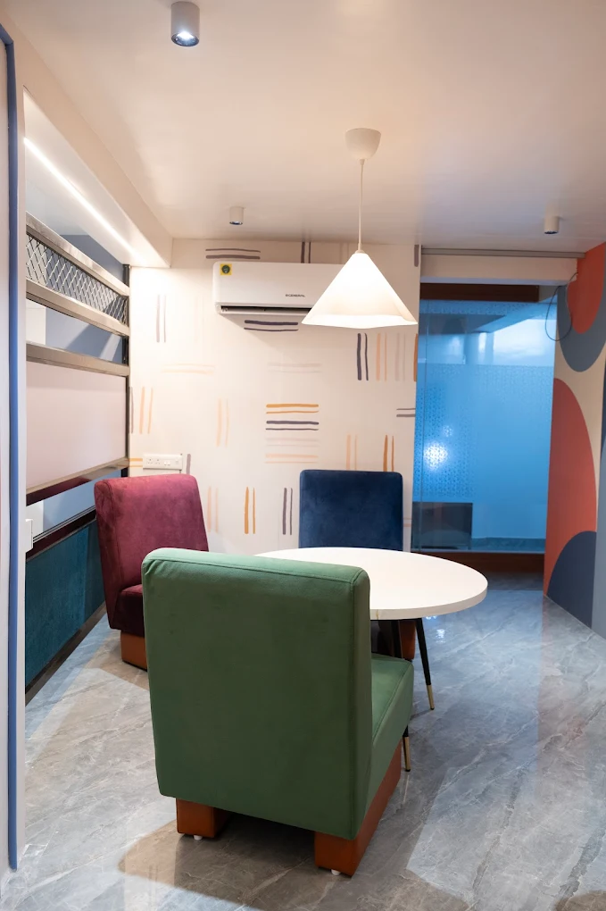 Think Hub branch interior — desks and private cabins