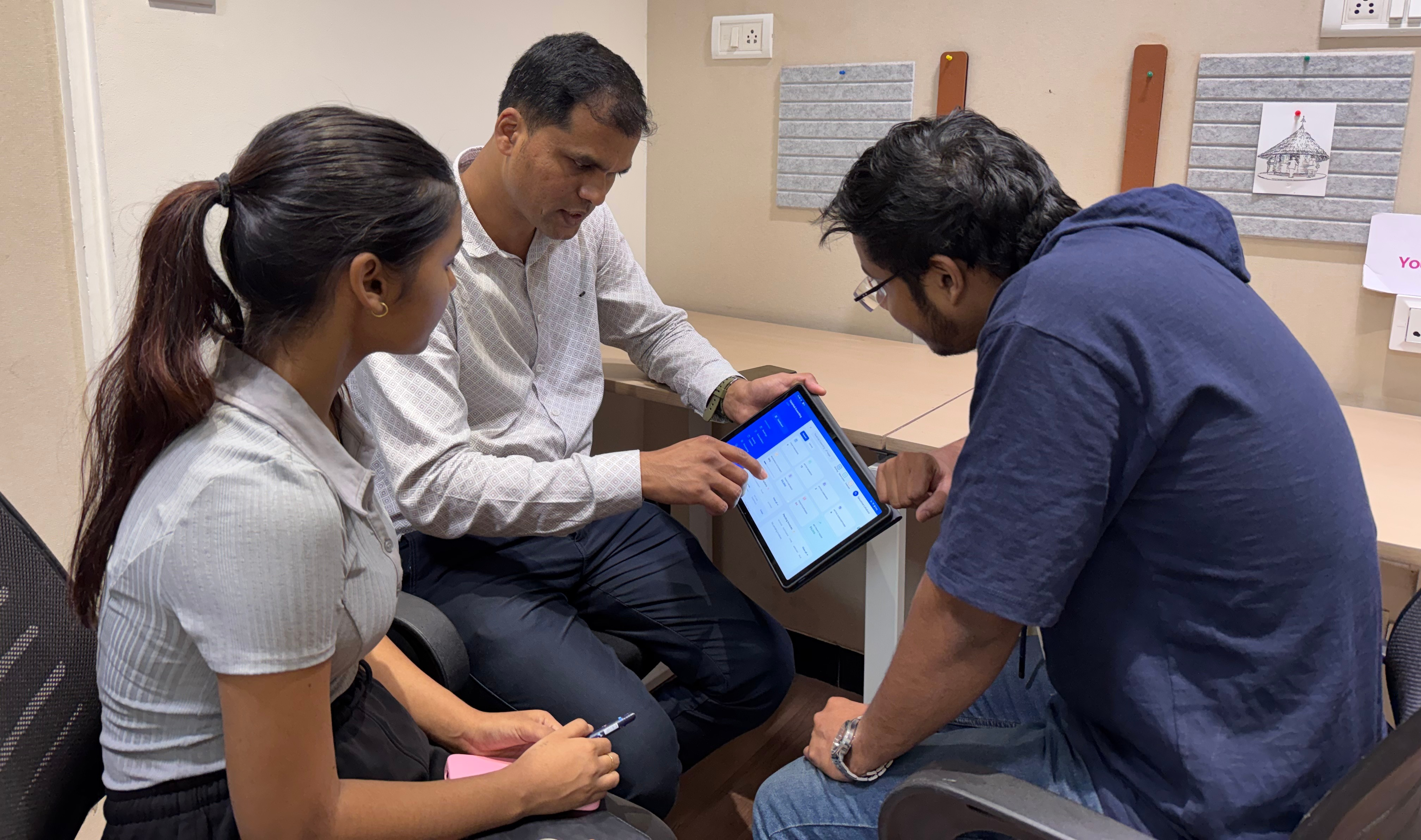 Think Hub team during the Kanrivo onboarding session — laptops and platform walkthrough
